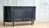 Angled view of the Louis Petite Sideboard, giving a comprehensive look at its design