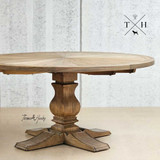 Front view of the elegant British-designed Darcy Oak Parquetry Round Dining Table, highlighting its sophisticated design