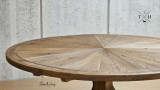 Close view of the inviting 180cm diameter surface of the Darcy Oak Dining Table, ideal for gatherings.