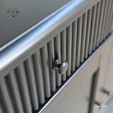 Close-up of the edge detailing on the Louis Buffet, accentuating its fine craftsmanship.