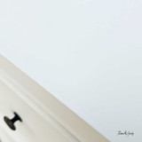 Close-up of the Piastri 3 Drawer chest finish showcasing the white paint stroke patina.