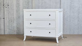 Angled view of the Piastri Chest displaying the three spacious drawers.