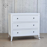 Side view of the Piastri Chest highlighting the sleek design and smooth surfaces.