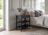 Thomas and Hurley Montclair Side Table in Black styled in a sophisticated, elegant bedroom.