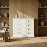Front Styled view of the Fremont 4 Drawer Chest in white in a modern home