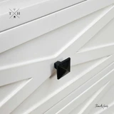 Close-up of the top drawer handle / knob detailing the square design.