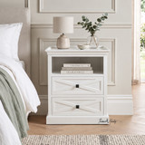 Fremont White Bedside Table featuring two X-pattern drawers and an open top shelf.