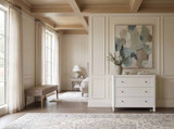 Brynmore white painted 3-drawer chest by Thomas and Hurley decorating a sophisticated luxury entryway.