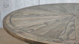 Tabletop Detail - Darcy Oak Round Parquetry Dining Table
Detailed shot of the tabletop, emphasising the intricate parquetry pattern and oak finish.
