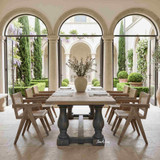 A large rustic oak dining table with double pedestal base for luxury interiors,  featuring a natural top and grey base