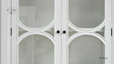 Close-up of the knob handles, reflecting the cabinet’s blend of classic and modern design.