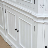 Close-up of the lower door panels, displaying the craftsmanship and texture.