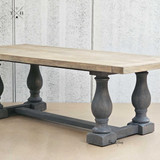 Side angle of the Parkhouse Double Pedestal Dining Table, featuring the distressed grey finish.
