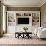 Custom built-in bookcase TV entertainment unit featuring Hamptons style cabinetry, decorative display shelving and concealed storage for elegant living spaces.