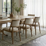 Styled image of Argent Dining Chairs around the Berkshire Double Extension Dining Table.