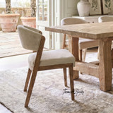 Angled perspective of the Stanton Dining Chair in a Modern dining room setting