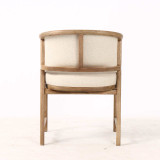 Rear profile of the Thomas and Hurley Windsor Dining Chair with vertical hardwood timber detailing and neutral textured upholstery, emphasising premium construction and timeless furniture styling