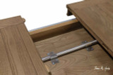 High-detail image of Berkshire Double Extension Table's double extension system featuring precision oak slides and concealed fittings.