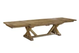 Hamilton luxury oak double extension dining table by Thomas & Hurley in its fully extended configuration, featuring twin end extensions and a sculptural cross-braced base.