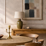 A detailed close up view of the Tisbury Round 135cm Dining Table by Thomas and Hurley showcasing the timber top and finish.