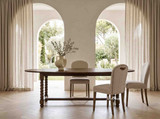 Luxury dining furniture by Thomas and Hurley showcasing a barley twist oval table and upholstered dining chairs in a contemporary classic setting.