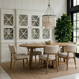 Ovalis 240cm Dining Table in natural oak styled front view in a hamptons style dining setting