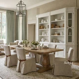 A styled view of the Sandringham Double Extension Dining Table with Carlyle Chairs by Thomas and Hurley, perfect for Hamptons inspired and contemporary dining spaces.