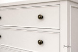 The Lando 6 Drawer Chest detailed view, showcasing accent handles and handcrafted design.