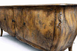 An angled view of the Featherington Commode highlighting its expressive form and sculptural craftsmanship.