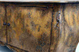 Door detail of the Featherington Commode showing understated hardware and a richly textured finish.