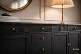 Close-up detailed view of the Louis Buffet 300cm in Black, accentuating its fine hand-finished paint finish, fluted drawers, and understated accent handles.