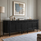 Angled view of the 300cm Louis Curved Sideboard in black in a modern hamptons style home