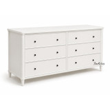 An angled view of the Brynmore 6 Drawer Chest in White displaying the six spacious drawers, perfect for Hamptons-inspired or modern bedroom or living room spaces.