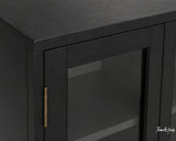 Contemporary black media unit sideboard with glass shelving, detailed close up view.