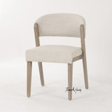 Luxury upholstered dining chair with brushed oak frame for modern Australian interiors