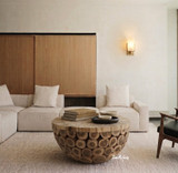 Premium quality round teak log trunk coffee table in warm minimalist style living room