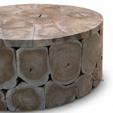 Close up detail of exposed wood rings and natural grain on the Maki teak round coffee table