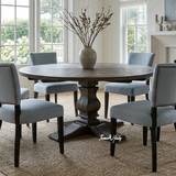 Modern classic dining room with Hampton Blue upholstered dining chairs and natural oak furniture