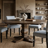 Designer dining space with Dalton Dining Chair in Hampton Blue and black timber legs by Thomas & Hurley