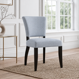 Premium Hampton Blue dining chairs styled in a sophisticated coastal dining room with natural light