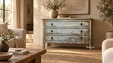 Beach house entryway styled with a heavily distressed blue-green wood dresser.