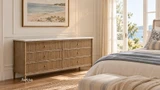 Designer bedroom furniture featuring Brookstone six drawer marble top chest in a Hamptons-style room