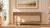Brookstone Marble Top Console beneath framed coastal landscape artwork in a Hamptons-style living room