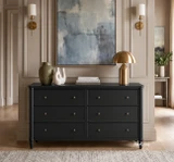 Elegant black chest of drawers for designer Australian interiors styled with art