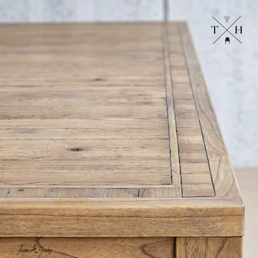 Detailed close-up highlighting the rich grain patterns on the Hartford's oak tabletop