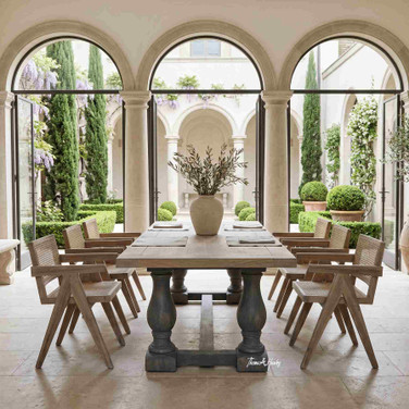 A large rustic oak dining table with double pedestal base for luxury interiors,  featuring a natural top and grey base