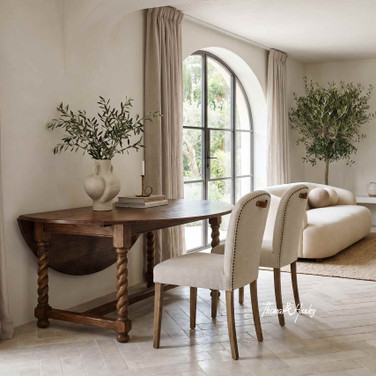 Thomas and Hurley Churchill Barley Twist Oval Extending Table and Stratford Dining Chairs styled in an elegant Hamptons-inspired interior with timeless appeal.