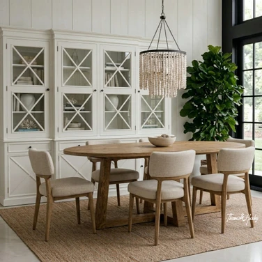 Ovalis 280cm natural oak dining table angled styled view in a luxury contemporary interior
