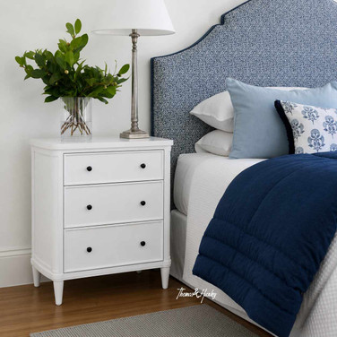 Luxury bedroom bedside table in white with classic tapered feet, also perfect as a storage side table