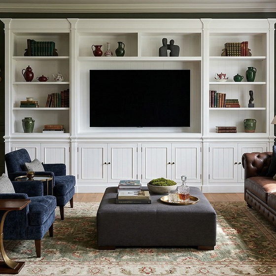 Large media wall unit secured in a living room
